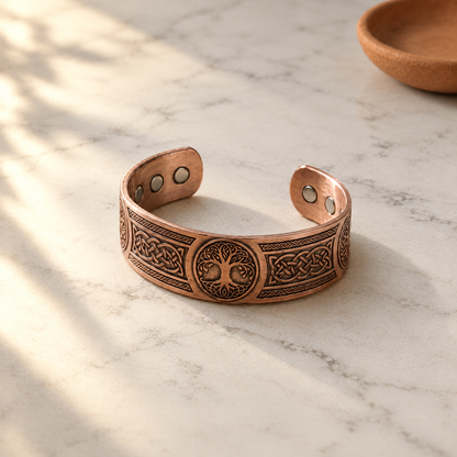 June's Bough Copper Bracelet – pure copper bracelet on a warm neutral background - photo 1