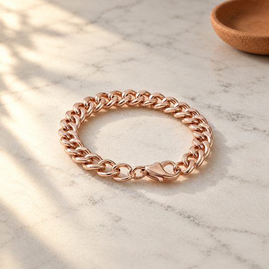 June's Cuffo Copper Bracelet – pure copper bracelet on a warm neutral background - photo 1