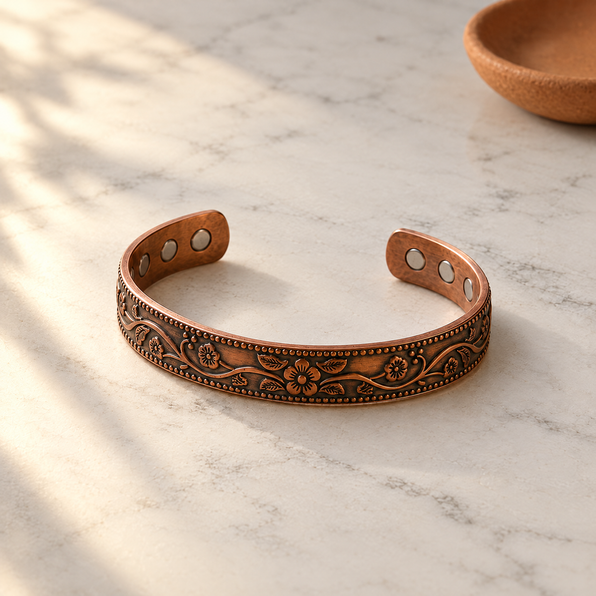 June's Knell Copper Bracelet – pure copper bracelet on a warm neutral background - photo 1