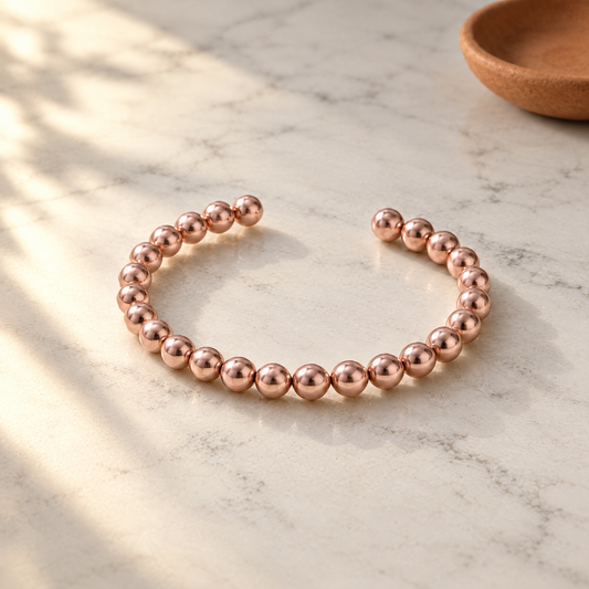 June's Prom Copper Bracelet – pure copper bracelet on a warm neutral background - photo 1